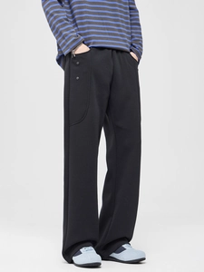 Pantalon en maille épaisse pour hommes avec jambes larges et détails boutonnés
