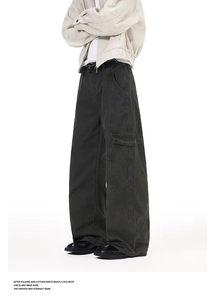 Detailed close-up showing the multi-pocket design and stitching of the wide-leg cargo pants
