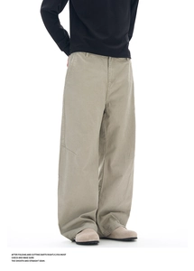 Detailed view of the smooth and straight seam on beige wide-leg cargo pants