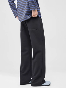 Pantalon large en maille épaisse pour hommes noir avec une coupe ample et décontractée