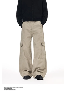 Detail shot of multi-pocket khaki cargo pants with vintage streetwear stitching