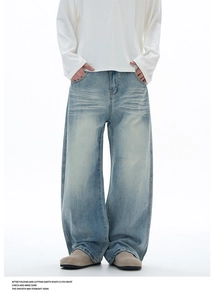 Vue détaillée du jean baggy vintage délavé avec moustaches et style rétro américain