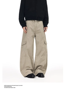 Close-up detail of khaki cargo pants showing side pockets and reinforced stitching