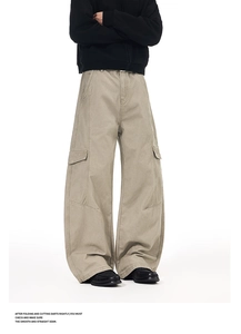 Detail view of multi-pocket cargo pants showing 3D paneling and curved leg design