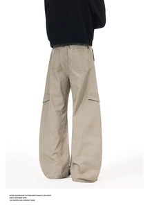 Rear view of khaki wide-leg cargo pants in oversized fit with multiple utility pockets