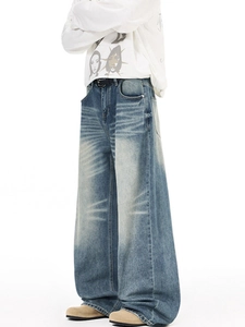 Vintage high street washed blue wide leg denim jeans with whiskering and loose fit