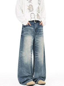 Retro washed wide-leg blue denim jeans with distressed whiskers and a loose oversized fit