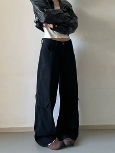 Classic American retro black cargo pants with a loose straight leg and utility pockets