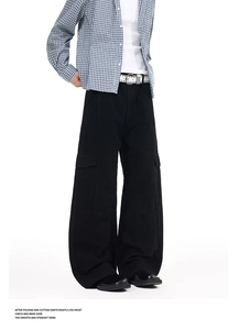 Detail showing smooth seams and flap cargo pocket on high-street black wide-leg pants