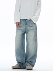 Jean ample pour homme au style rétro avec effet de délavage vintage et moustaches de chat