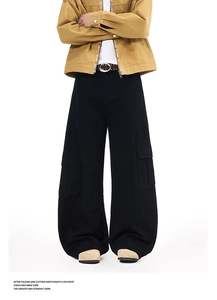 Detailed view of black cargo pants with large side pockets and vintage stitching details