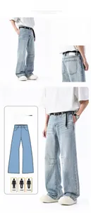 Détails du jean droit bleu clair avec coutures aux genoux et ceinture tressée noire