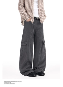 Detailed view of cargo pocket and reinforced stitching on vintage wide-leg work pants