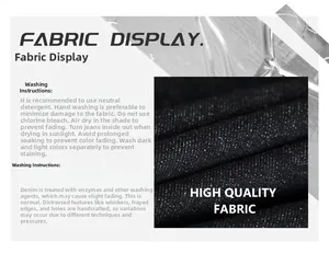 Detail of baggy raw denim fabric showing macro texture and garment care instructions