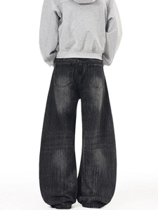 Retro washed dark gray oversized wide-leg denim jeans with a street style baggy silhouette