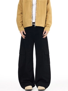 Men's vintage black wide-leg cargo pants in heavy cotton with utility side pockets