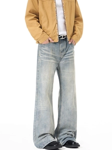 Retro washed light blue flare jeans with vintage whiskering and relaxed straight leg cut