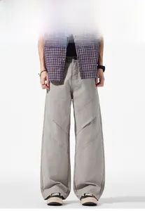 Vue détaillée du pantalon de travail gris vintage avec coutures diagonales uniques