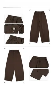 Detail shot of deep brown cotton straight-leg trousers with elastic waist and pockets