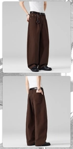 Détail du pantalon décontracté marron à jambes larges avec ceinture et accessoire