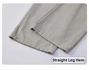 Gros plan détaillé de l'ourlet droit et de la texture en coton du pantalon cargo gris