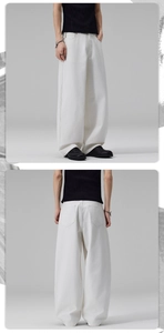 Détail d'un jean blanc à jambe large avec taille haute et texture en denim épais