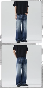 Détails du délavage vintage bleu foncé et des moustaches sur ce jean droit pour homme