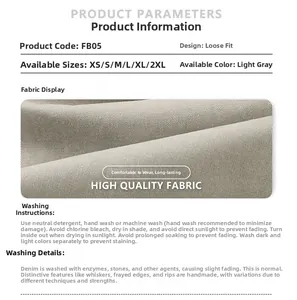 Gros plan détaillé sur le tissu denim sergé gris clair pour pantalon cargo ample