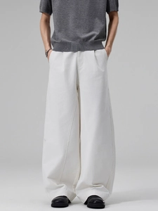 Men's minimalist white wide-leg pants featuring premium cotton and vertical stitching detail
