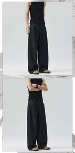 Detail of loose fit dark washed denim jeans with straight leg cut for men and women