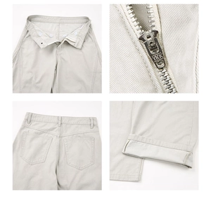 Détails du pantalon cargo beige avec fermeture éclair YKK et taille à double boutonnage