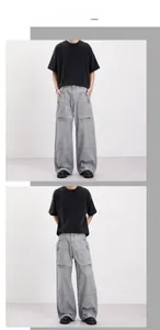 Close-up of vintage wide-leg cargo pants featuring 3D pockets and knee zipper detail