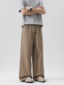 Men's loose straight-leg cargo pants in brown with unique multi-button fly design