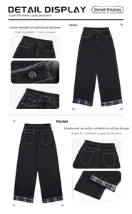 Detail view of black straight leg denim jeans featuring plaid pattern inner cuff lining
