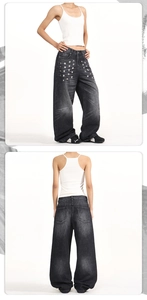 Détails du jean gris délavé vintage avec rivets métalliques carrés et coupe droite