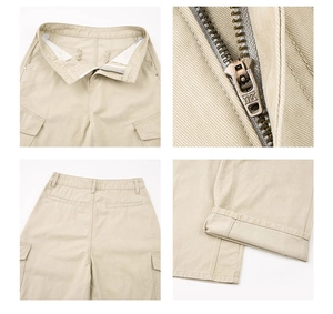 Dettaglio dei pantaloni cargo kaki con cerniera YKK e cuciture rinforzate di qualità