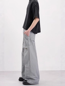 Men's vintage grey wide-leg cargo pants with side pockets and metal zipper details