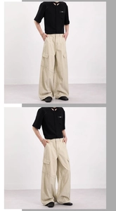 Dettaglio dei pantaloni cargo con grandi tasche a patta e vestibilità ampia rilassata