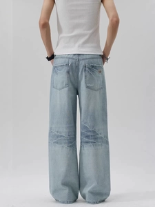 Jeans vintage azzurri a gamba larga con tasche posteriori e design americano retrò