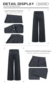 Detailed view of high-waist pleated wide-leg trousers with curved silhouette and deep side pockets