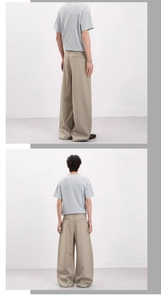 Détail du pantalon large à rayures verticales beiges de haute qualité pour hommes