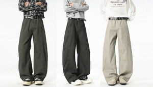 Detailed comparison of wide-leg cargo pants in dark green, charcoal gray, and khaki tones