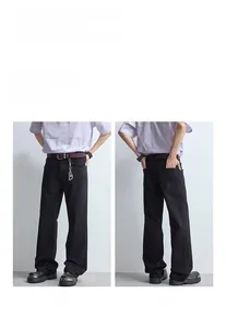 Vues détaillées avant et arrière du pantalon évasé noir avec ceinture et porte-clés