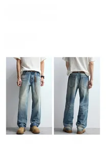 Front and back view of relaxed straight-leg blue denim jeans with vintage wash and whiskers