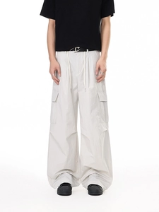 Lightweight off-white cargo pants with drawstring waist and wide straight leg for men