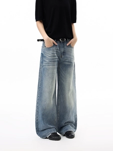 Retro loose wide-leg jeans in washed blue with classic whisker process and oversized fit