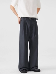 Men's loose dark grey pleated wide leg dress pants with high drape and minimalist belt