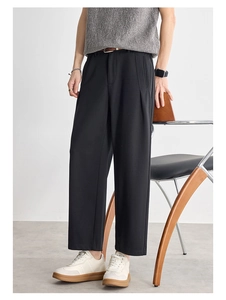 Modern black men's trousers with a smooth drape and straight cut for casual wear