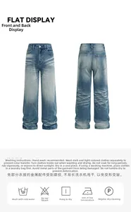 Flat display of vintage blue straight-leg jeans with whiskering and washing effects