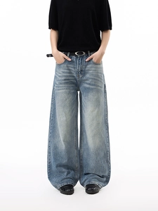 Retro wash light blue wide-leg jeans with whiskered detail and a relaxed high-waist fit